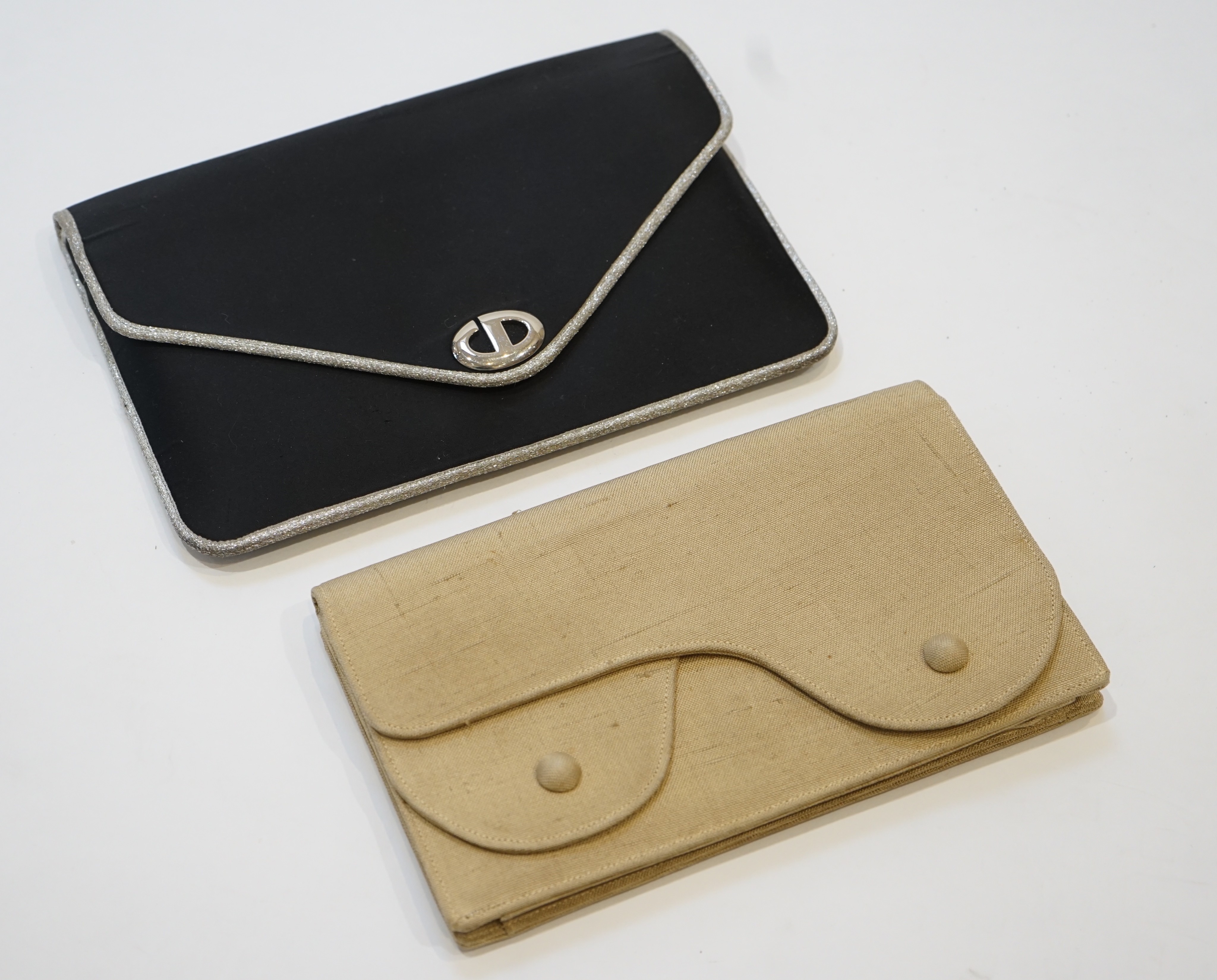 Two Christian Dior clutch bags